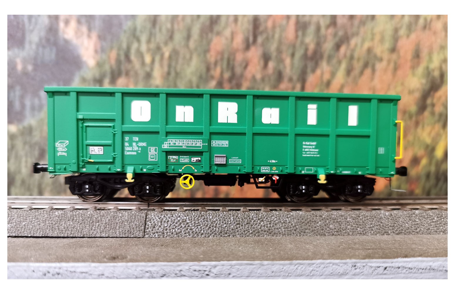 NME H0 540600 - Carro aperto tipo Eamnos 57mc. "OnRail" con logo , ep. VI